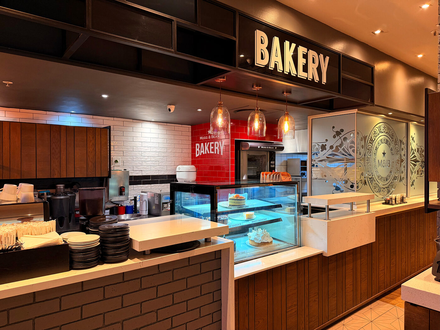 The bakery and cake display counter at Mugg & Bean Blue Route